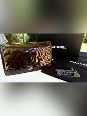 CHANEL Burgundy Camellia-Embossed Patent Leather Wallet with Silver CC
